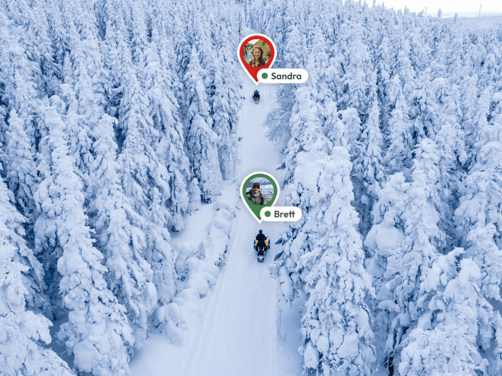 Group of friends on a snowy forest trail shown on the No Roads map